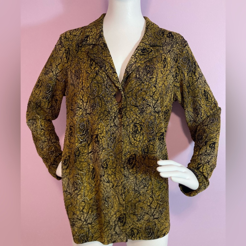 Blazer with single button closure